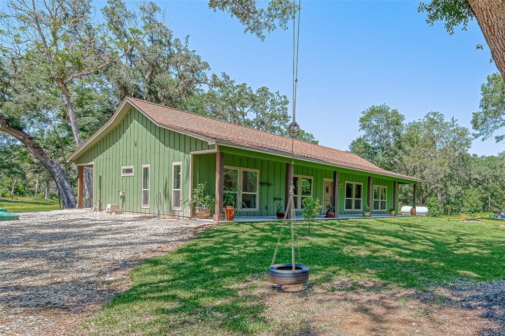 Calling all nature lovers!! 13+ acres that is mostly heavily wooded with a beautiful farm house and moss draped oak trees. Enjoy the peace and serenity of a private neighborhood with low HOA. House makes great use of space and has an open concept. The large kitchen island will be the gathering spot for entertaining, cooking, kids doing homework, etc. Evenings will be spent on the large screened in back patio that approximately 43' x 10' and has two gas connections for outdoor cooking. Store your vehicles and equipment in the 30' x 40' metal shop with a 20' awning. Great privacy and only 25 minutes from a grocery store! Easy access to 288 and only 15 minutes from Sargent!