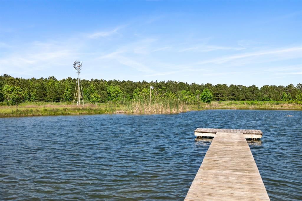 The 1 acre stocked pond with fishing and swimming pier is located near the residences.