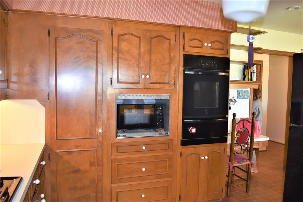 Wall oven where you don't have to bend over! Microwave next to it with large pantry