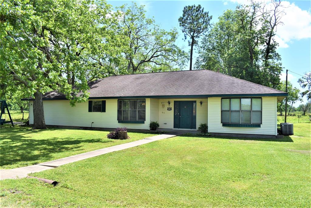 Vinyl siding for easy maintenance with BAY windows for those flowers, herbs and knick-knacks!