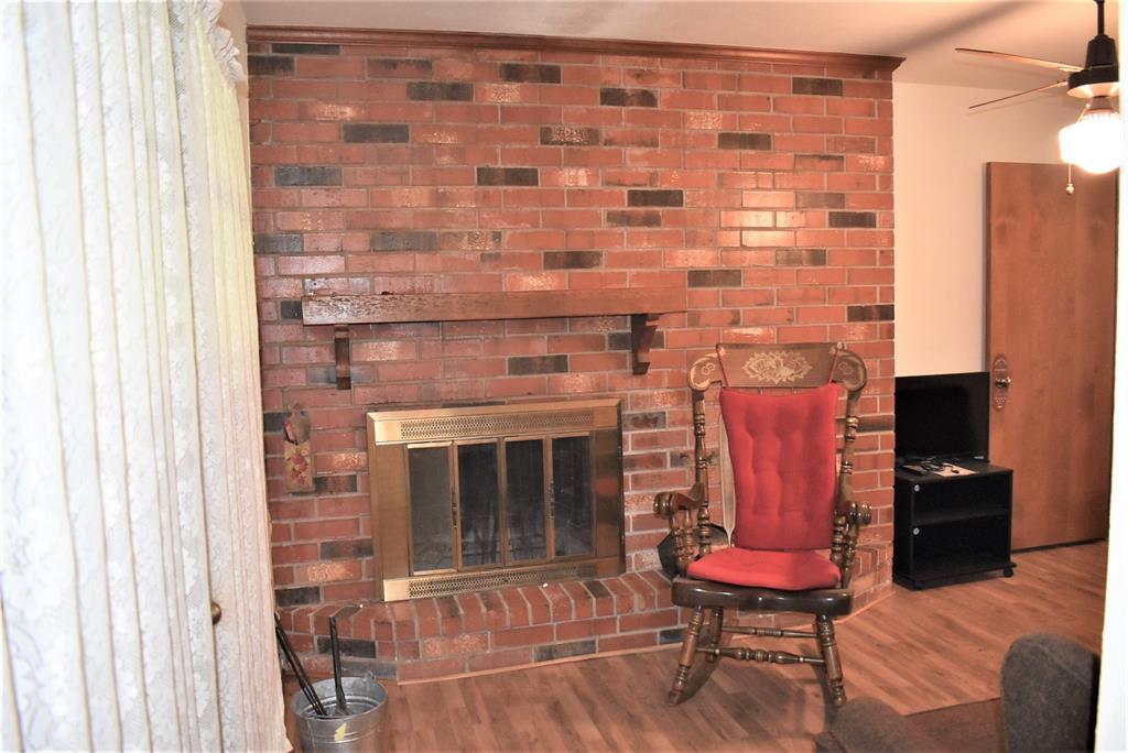 Another view of this fireplace in sitting room