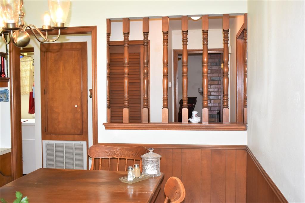 Wainscoting trim along walls in dining room
