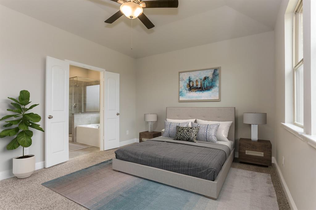 **Home is Under Construction. The photo shown here is of a completed home that has the same floor plan and similar elevation. Options and color selections may vary.**