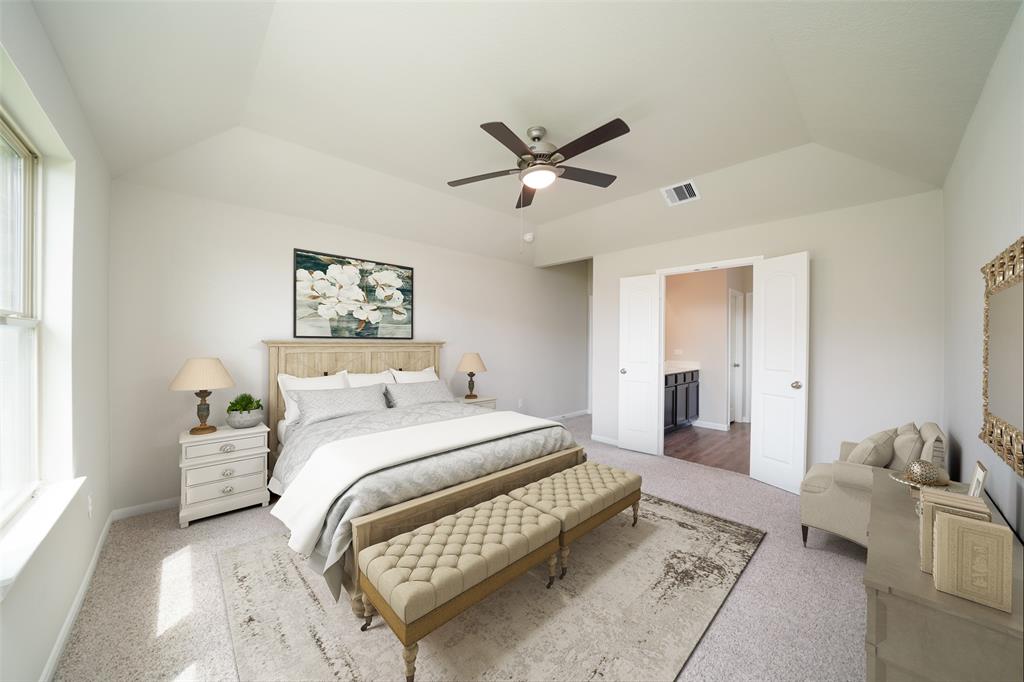 **Home is Under Construction. The photo shown here is of a completed home that has the same floor plan and similar elevation. Options and color selections may vary.**