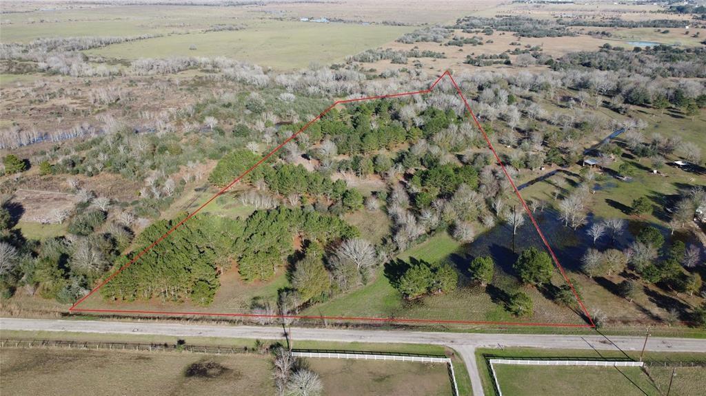 HORSE LOVERS DREAM! Build your private custom home, barn, and stables on this 10+ acres priced to sell in Waller. Lots of mature trees and it is not far from 99, 290 and the Cypress area for an easy getaway or commute. This area attracts many birds from the nearby Katy Prairie Conservancy. The property is ideally zoned to the Waller I.S.D. There are numerous horses, livestock, and lovely homes nearby. Fantastic ranch setting. NO MOBILE HOMES ALLOWED. One single-family home with a minimum of 1500 square feet per property. "Barndominiums" are subject to HOA restrictions. Goats and non-commercial fowl are permitted as personal livestock. NO MUD TAXES APPLICABLE! (Well and septic needed) Schedule your showing to view this exceptional property today!
