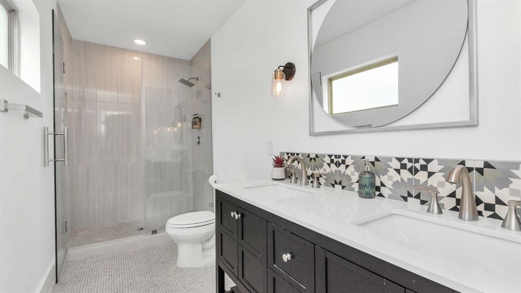 The ensuite features a beautiful walk in shower, and double vanity.