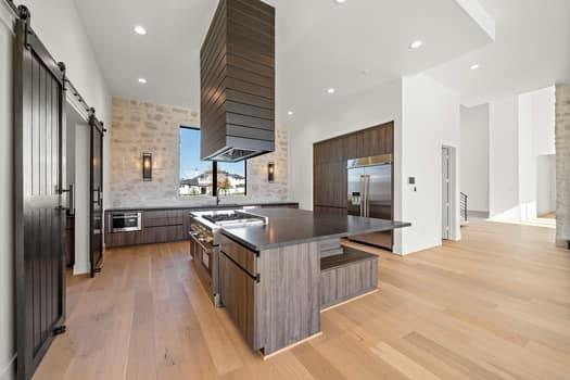 The main kitchen has a modern flair and upgraded appliances.
