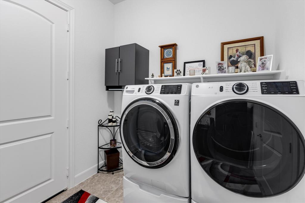 Laundry room just across from the powder room