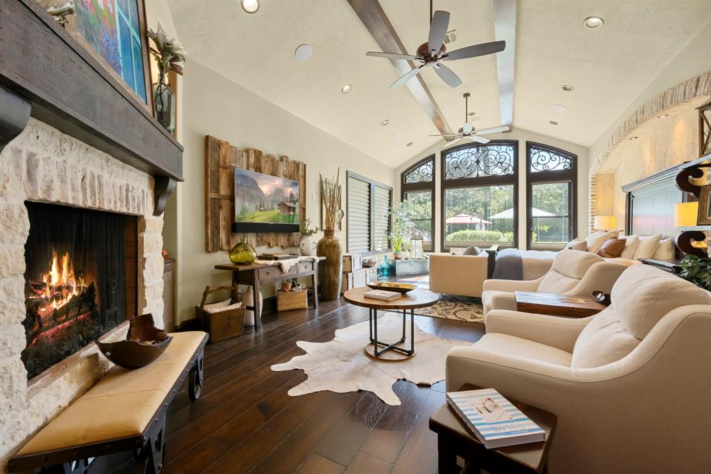 The primary bedroom leaves nothing out... Room for separate seating area, full sofa, tv and fire place with a beautiful view of the pool.