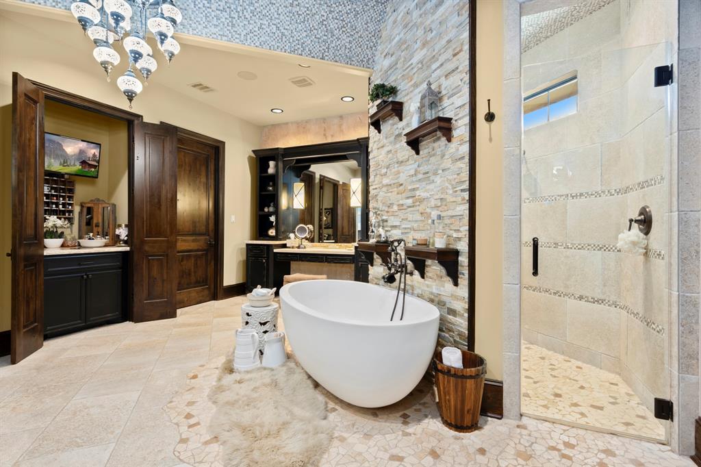 And while you are getting ready at your separate vanity / dressing table enjoy the coffee bar located near 1 of 2 full  walk-in closets