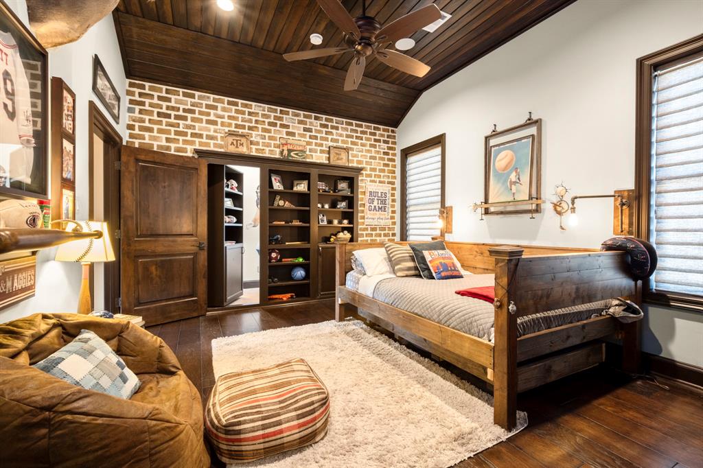 Book case moves and can be closed and locked. Separate room located behind.