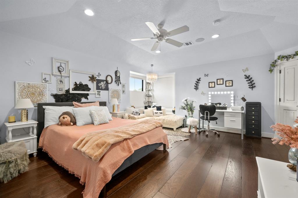 This bedroom faces the north elevation (front) of the home and has a beautiful window nook, impressive closet and special en-suite bath with shower and soaking tub.