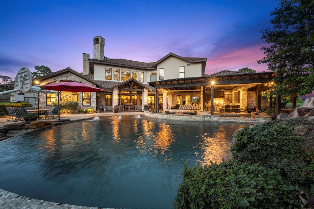 Lush landscaping and a beautiful rolling yard give this property the perfect backdrop to call this house a home.