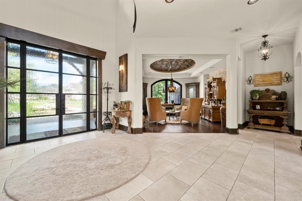 On the East side of the homes entry the formal living room is perfect for entertaining or could double as another dinning room.