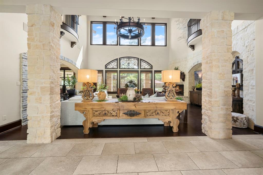 Upon entering the home beyond the foyer you are greeted by an expansive living room.