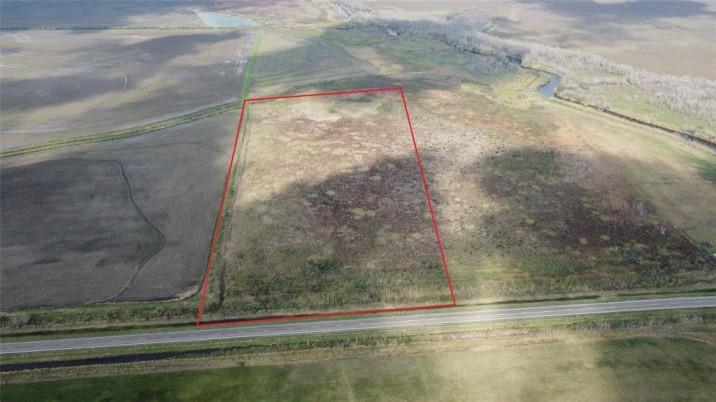 This over 20-acre agricultural land located in Double Bayou, TX, is an excellent opportunity for those seeking to own a property with ample space for farming, livestock grazing, and other agricultural activities. Located east of Houston and just 20 minutes south of I-10, this land is easily accessible and convenient for transportation. The property boasts a level topography and is predominantly composed of sandy loam soils. The land is currently undeveloped and has no structures or improvements, allowing for a blank canvas to create the perfect agricultural operation. It is well-suited for a variety of crops, including cotton, rice, and corn, and can also support livestock operations, such as cattle or horses. The property's location in Double Bayou also presents a unique opportunity for recreational activities, including hunting and fishing. The land is situated in close proximity to the Trinity River and the East Bay, offering abundant opportunities for fishing enthusiasts.