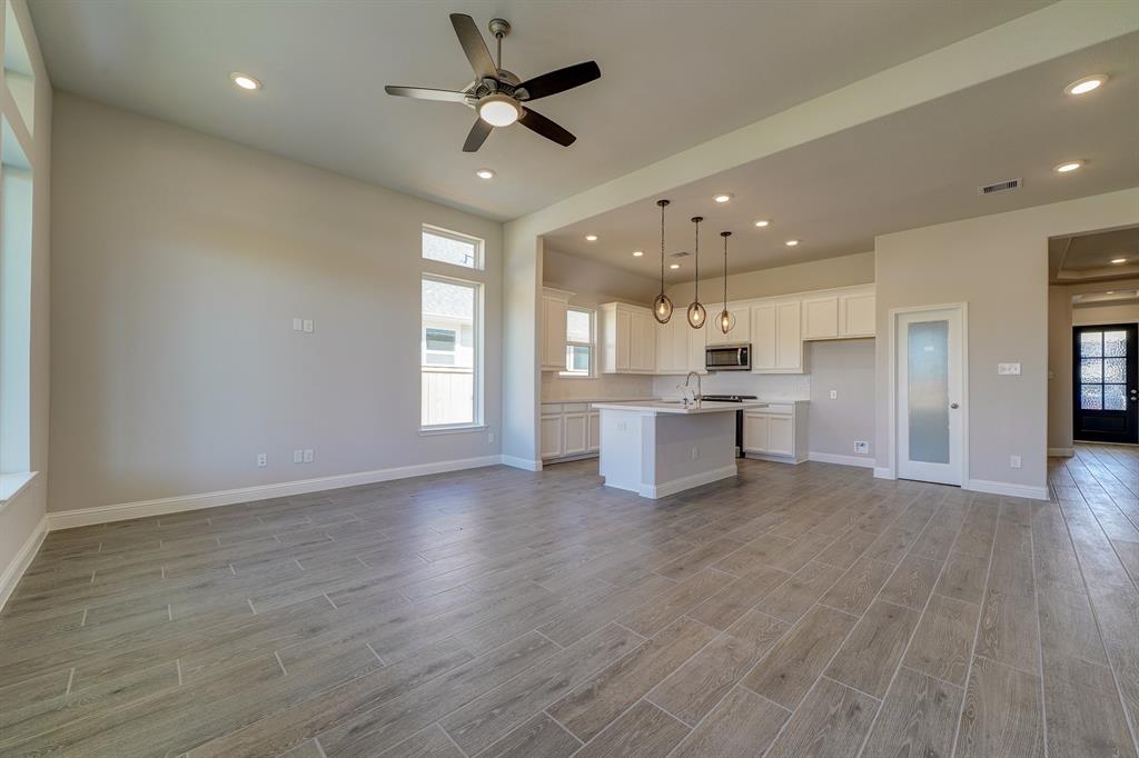 **Home is Under Construction. The photo shown here is of a completed home that has the same floor plan and similar elevation. Options and color selections may vary.**