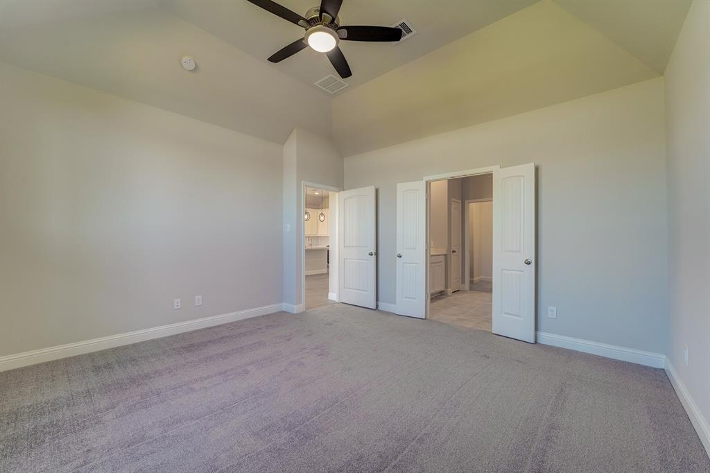 **Home is Under Construction. The photo shown here is of a completed home that has the same floor plan and similar elevation. Options and color selections may vary.**