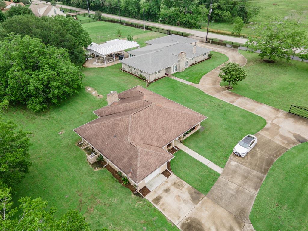 Welcome to 2.19 Acres of peaceful serenity at 1503 and 1535 Krenek Rd.  The main house (1535 Krenek Rd) is approx 2757 sf and features 3 bedrooms, 2 full + 2 half baths, 2 fireplaces, 3 car garage + 3-car carport, living room, dining room, a large enclosed sunroom and outdoor pavilion.  The guest house (1503 Krenek Rd) provides an additional 1731 sf (approx) and features 2 bedrooms, 2 bathrooms, quaint kitchen, living room / dining room combo with high ceilings, fireplace, indoor utility room, a 1-car garage and back covered patio.  This fully enclosed and gated property has a circular drive that connects both dwellings to both gated access points.  This property is being sold as a bundle to include both 1503 and 1535 Krenek Rd.  Both homes share a water well, each have a septic, and the main house has a generator.  If you’re looking for the perfect place to call home just minutes away from the big city life, here it is.  Buyer to verify all info.  Listing Agent is related to sellers.