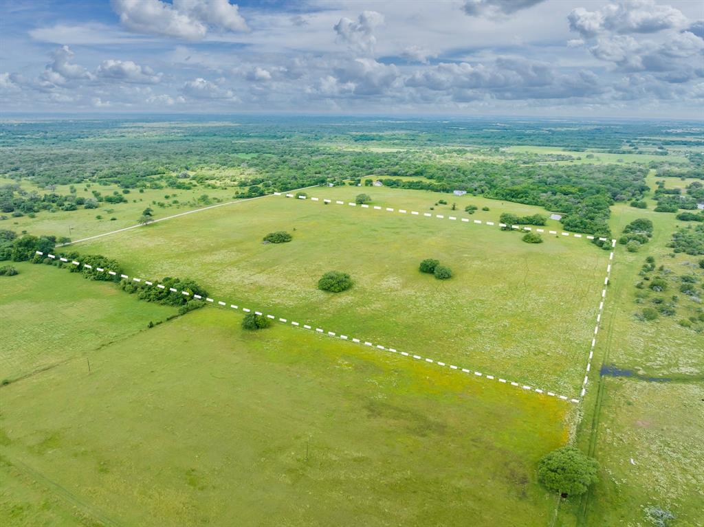 Down a country road outside of Yoakum, you’ll find 38+ acres ready for cattle grazing or cutting hay. An ag valuation is in place.  Even better than that, if you’re looking for a home site, this is it!  There’s a high spot that provides a view of the surrounding area with oaks scattered here and there.  This raw land is waiting for you to use your imagination!  An entrance will need to be constructed and one side is not fenced. (It was part of a larger parcel that was divided.) Seller is conveying minerals.  Call the listing agent for more information.