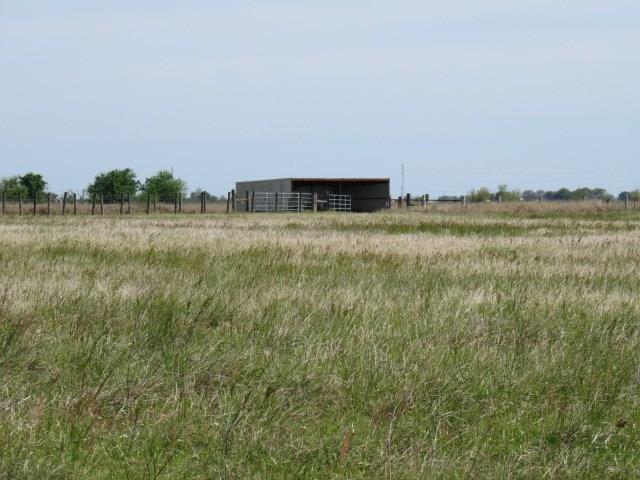 110 +/- Acres improved pasture.  Perimeter Fenced & Cross Fenced. Cattle shade, hay barn, equipment barn, working cattle pens & chute, water well, pond.  If 110 +/- acres is more than you need seller will entertain selling 80 +/- acres at an adjusted price.