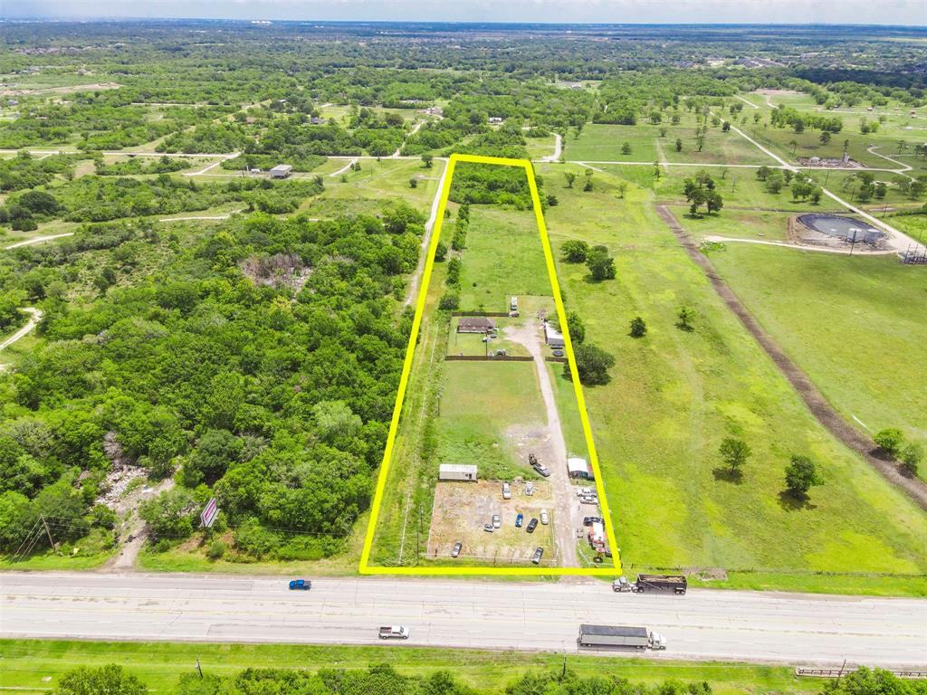 VERSATILE 5 ACRES IN ALVIN WITH ONE RENTABLE DWELLING AND MANY OPPORTUNITIES. THIS 5 ACRES IS RIGHT ON THE HIGHLY TRAVELED 35 BETWEEN ALVIN AND PEARLAND. THE OPTIONS ARE ENDLESS AS THIS COULD BE INSTANT INCOME WITH STORAGE, RETAIL, or RESIDENTIAL LEASE. New map shows property to be 90% out of flood plain.