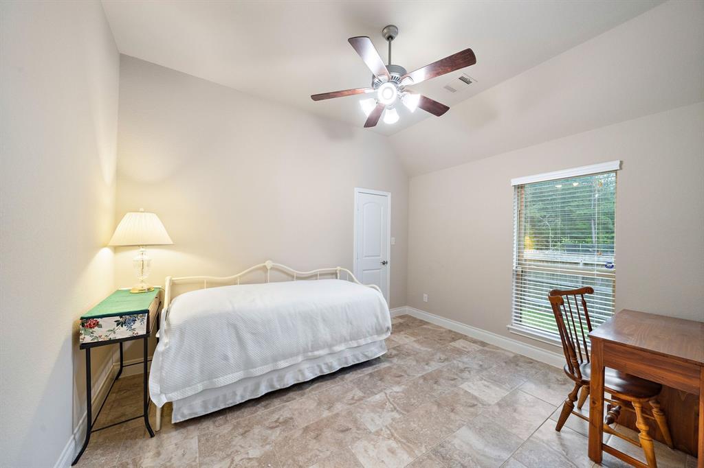 Easily customize this secondary bedroom with a seating area by the windows into a separate office, a home gym, or any other use that suits your needs.