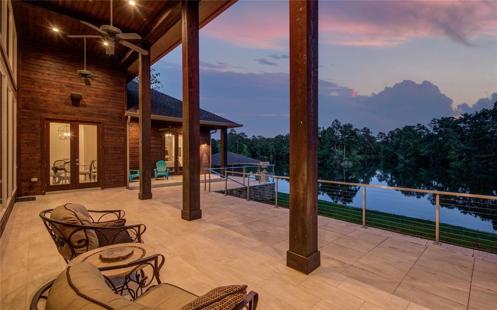 A rustic cedar and limestone exterior wraps around the modern home