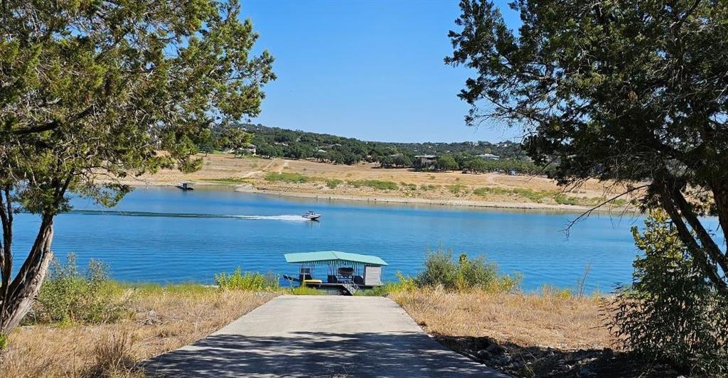 EVEN TODAY - DEEP Waterfront - Your private boat dock is waiting for you. The boat dock has 2 slips, jet ski cable lift, 1 swim ladder and storage. The top of the rail system is at about 700 ft elevation. The boat is not included.