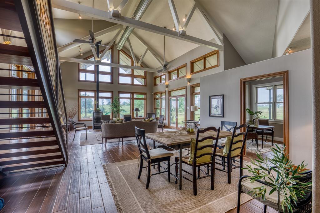 Beautiful 18.42 acres w/a uniquely designed 3,549sf home. Upstairs primary suite features lg walk-in closet, huge glass block shower w/multiple heads, separate claw foot tub & toilet w/bidet. The kitchen boasts a walk-in pantry & breakfast nook & the cabinets are custom-made from Alder wood. Just off the kitchen is the lg mud/utility rm w/half-bath and the warm entry/library flows into the office and Jack & Jill bath and second bedroom.  The living rm is filled with windows from floor to ceiling creating a picturesque view from almost any angle in the home. 20’x25’ workshop & additional garage for added storage & workspace. MORE PHOTOS COMING SOON!!