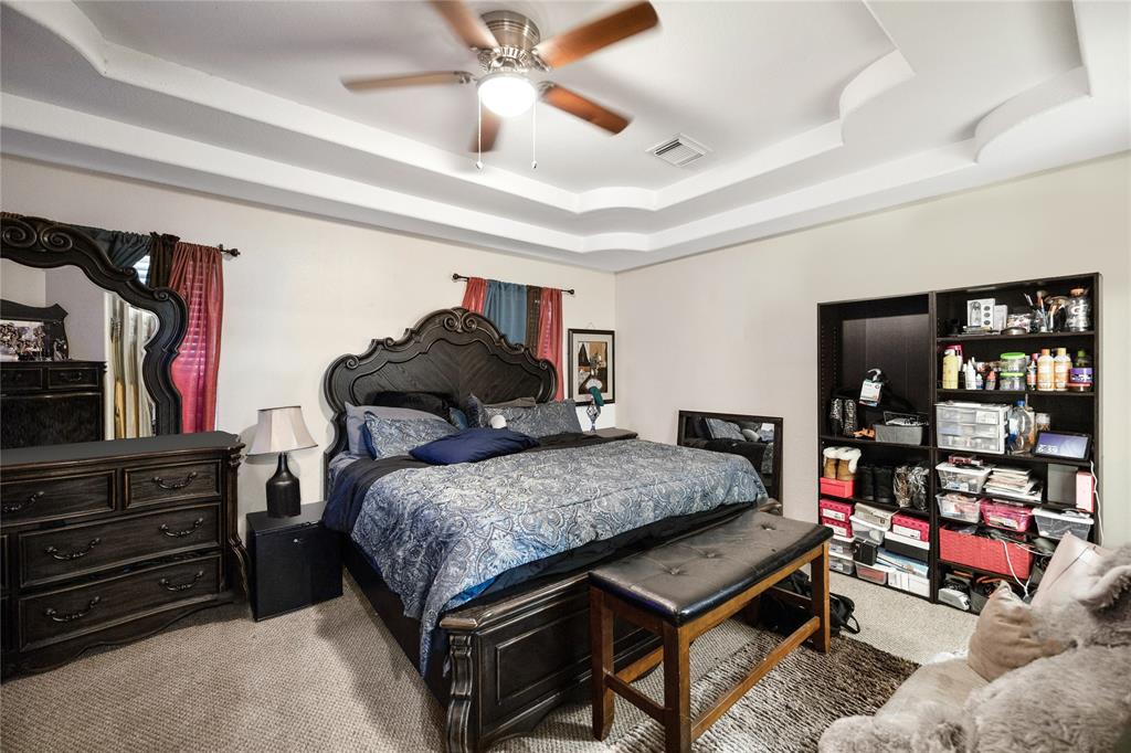 Primary Bedroom with Crown molding Ceilings