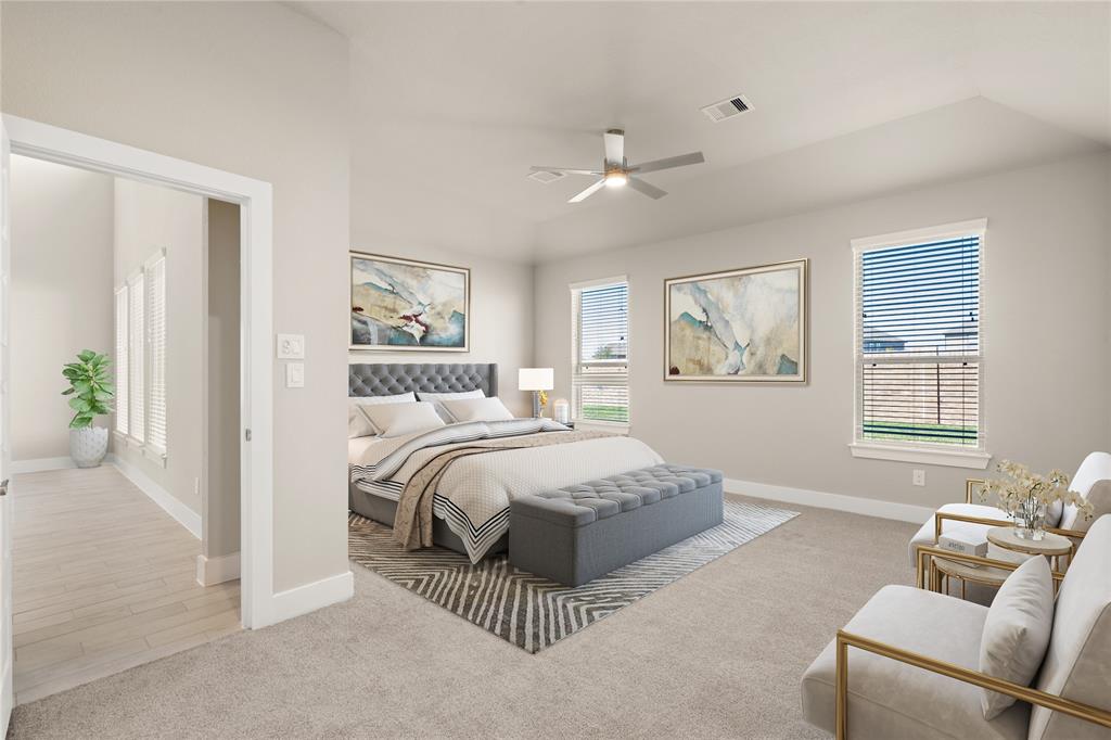 Come and unwind after a long day in this magnificent primary suite! This spacious room features plush carpet, warm paint, high ceilings, ceiling fan and large windows with privacy blinds.