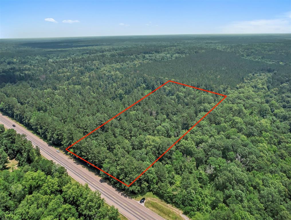 This stunning, fully wooded, 14.42 acres in Hardin ISD, is timber exempt and was last cut about 7 years ago.  If Timberland is not what you are looking for, this property has many other possibilities.  With over 300 ft of road frontage, it’s perfect for commercial use or hunting land.  If you are looking for a piece of land, to build your custom home with a pond and plenty of room for livestock to graze, or just to spread out and build your dream it has an excellent size and shape, surrounded by timber ownership for quiet neighbors. Be sure to schedule your showing today. Timber exemptions, low taxes, no flooding, no HOA or restrictions.