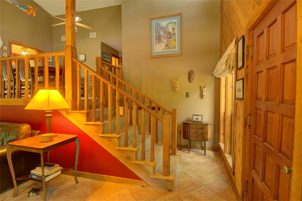 Behind the stairs is another stairway to access the breezeway.
