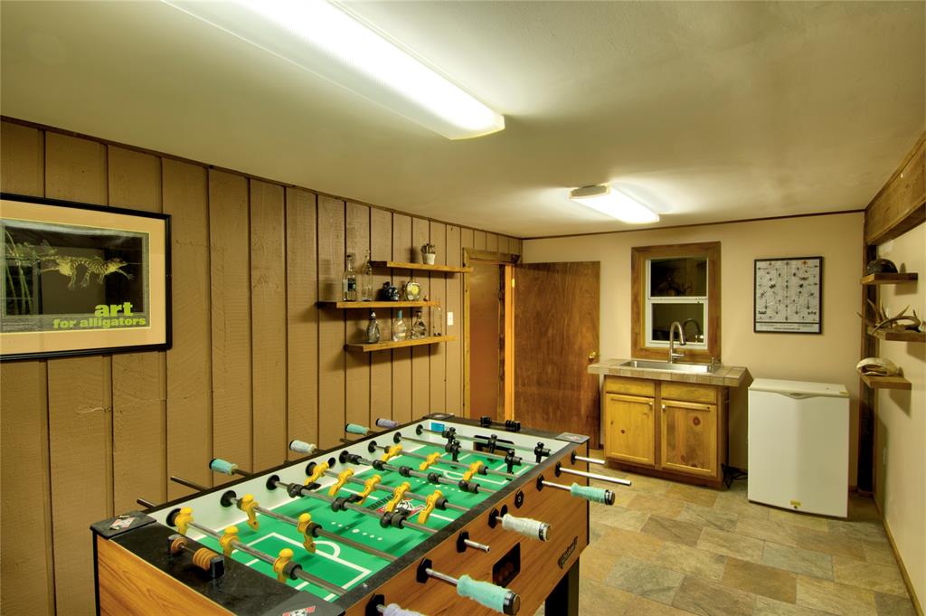 Another view of the game room with a built-in sink.