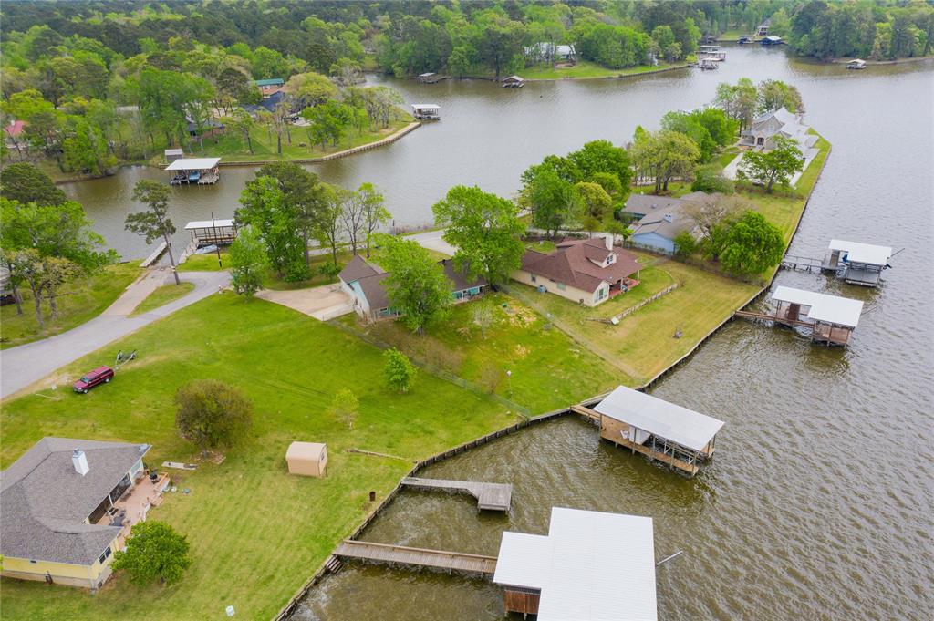 Aerial view of The Landing with the community boat ramp and dock in the background.