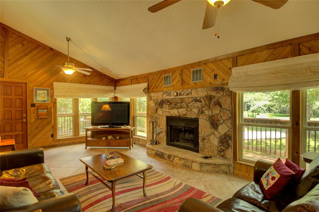 Enjoy the tranquility emanating from the natural elements this family room has to offer.