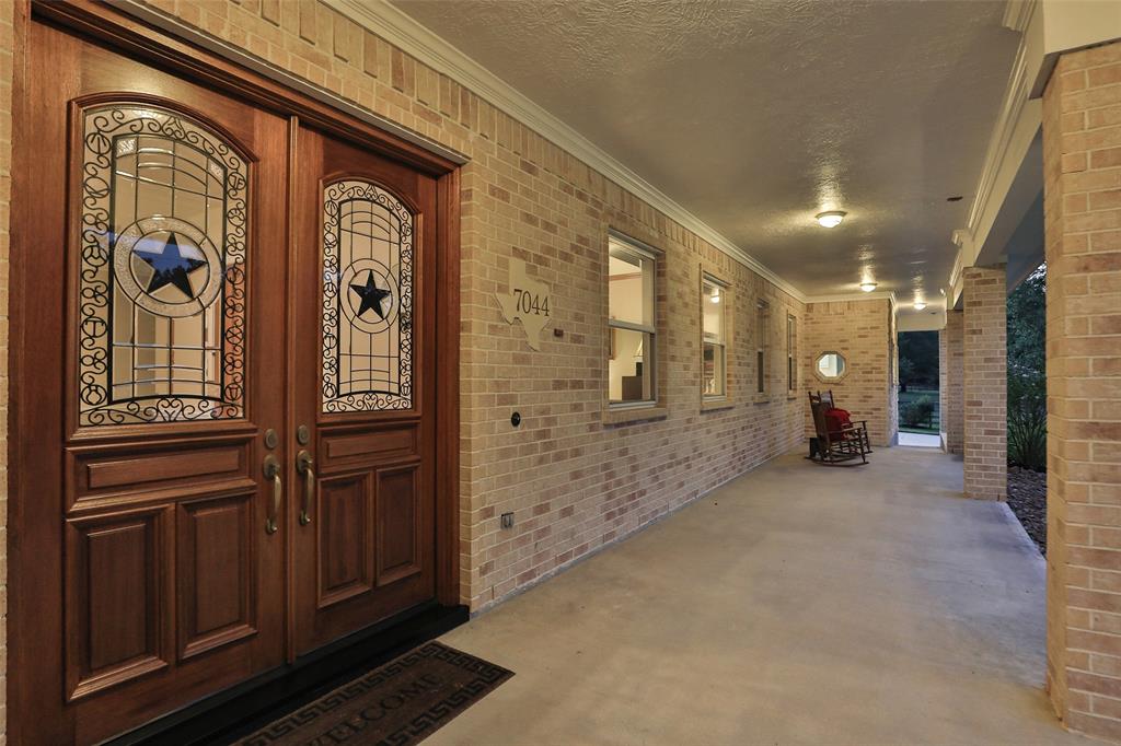 View of this massive porch. Handicapped ramp to access.