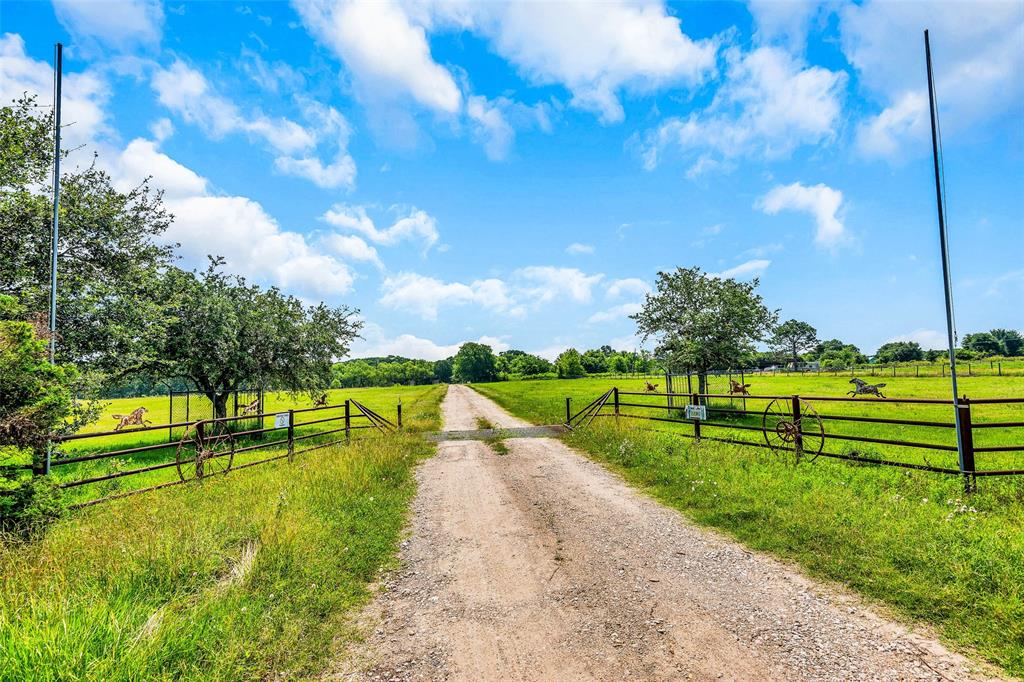 This farm and ranch property spans 44.4 acres and is located in Hungerford Tx. This lot includes tract A20034 ABST.34 Tract 14A-15A-1A. The property is relatively flat and has a mixture of open pasture and wooded areas. There is a small pond located on the southern section of the property, as well as a creek that runs through it. The soil is predominantly clay and sand, with some loam and silt. The property is fully fenced and cross-fenced, with a metal gate at the front. There are several outbuildings on the property, including a metal barn, two storage sheds, and a 1-bedroom cabin. The property is serviced by a private well and septic system. Electricity is provided by Wharton County Electric Cooperative. The property is accessed via a paved county road and is located approximately 7 miles from the town of Hungerford. Perfect for an Investor looking to build a subdivision away from the hustle and bustle.