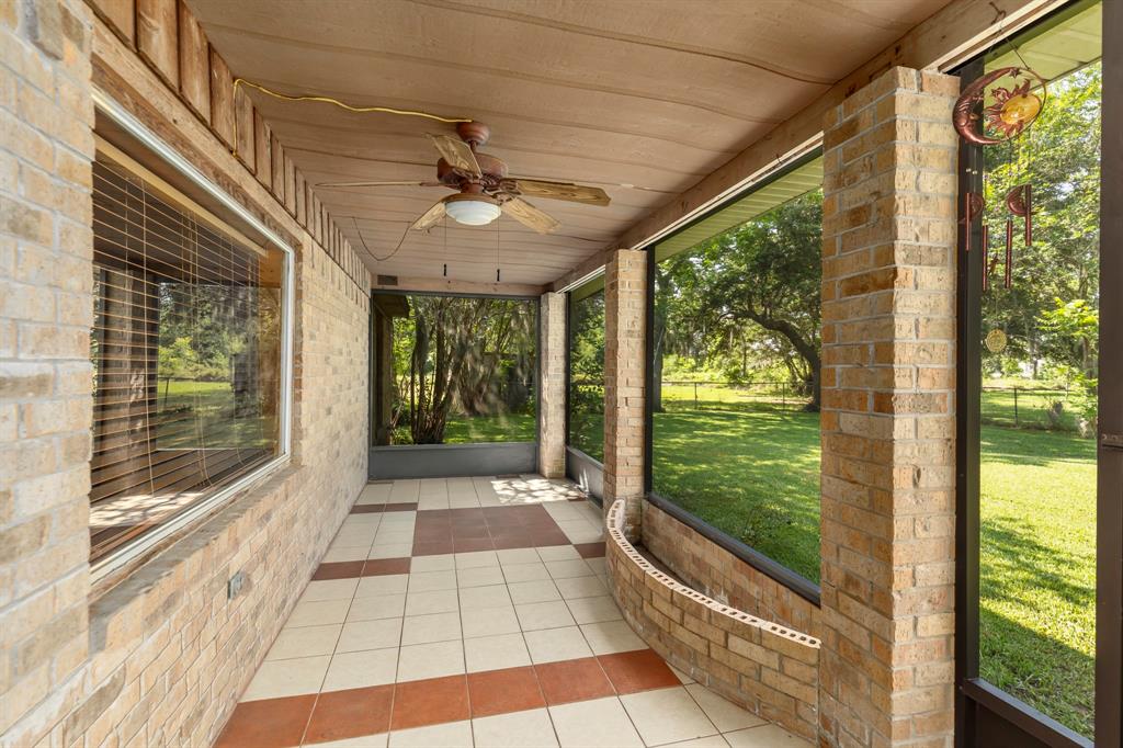 Nice find here with a 3 bed, 2 bath home on 12.89 acres outside of Sweeny, TX.  Home features a nice large screened in front porch, fenced yard and two car garage.   Thickly wooded property great for hunting/leisure or just enjoy it.   Also includes a 1,200 sq ft metal workshop with 2 roll up doors.  Plenty of shade trees.   This property has a lot to offer.  Not in a flood zone.   Call for all the details.