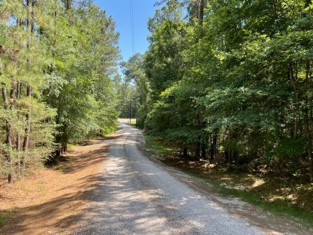 13+ Acres in booming Montgomery, TX with FM 2854 frontage. Heavily wooded w/ timber exemption in place, unrestricted.