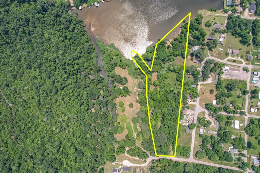 Rare Find.  This is the one you have been waiting for! Over 5 acres in Onalaska. Large shade trees. Plenty of room to build your dream home. Property is waterfront. Come check it out and schedule an appointment.