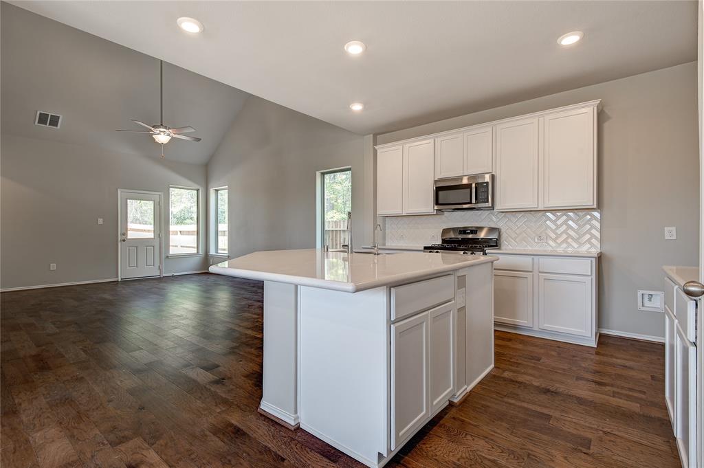 Superb layout of kitchen for the cook or those who just like to entertain.  gameroom upstairs overlooks large family room.