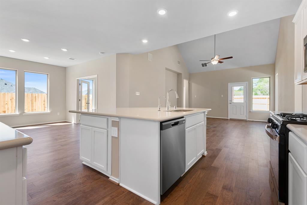 Dining room on the left, doors lead to flex room/study, large family room.  Gorgeous!
