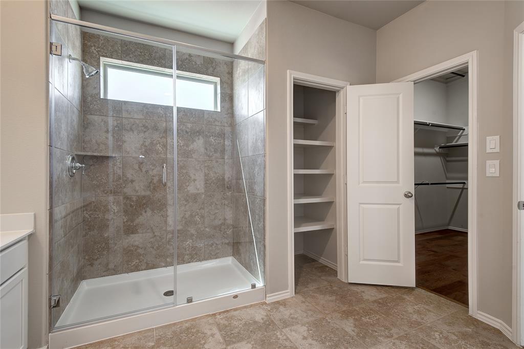 Walk in shower is large with lots of light.  Large walkin closet.