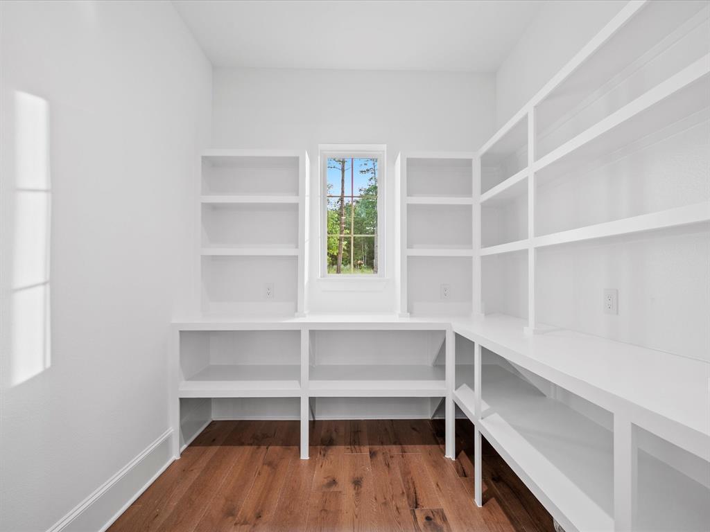 Walk-in Chef\'s pantry/office offering great storage and space for desk to be added if desired!
