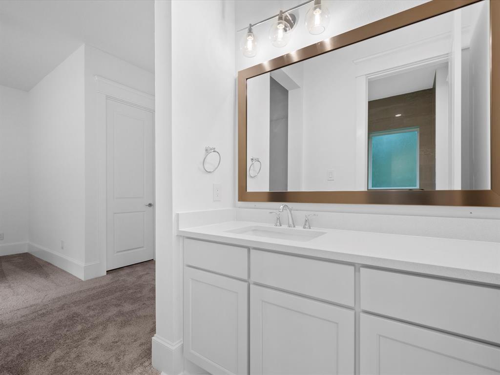 Each bedroom enjoys a private sink and vanity