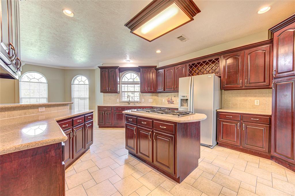 Welcome to your gourmet kitchen! Kitchen offers solid wood cabinetry for plenty of storage as well as so much counterspace!