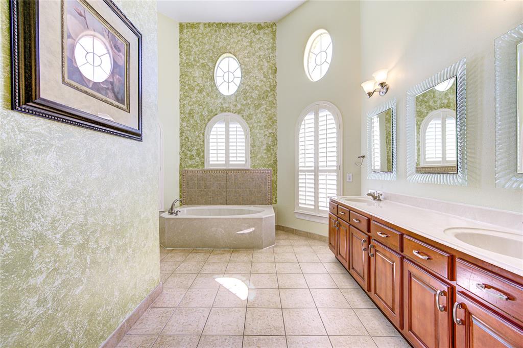 Bathroom offers plenty of cabinetry for all of your storage needs.