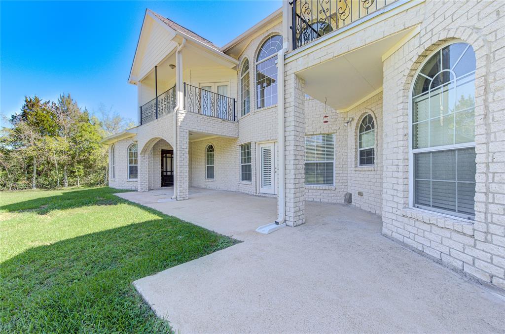 All brick exterior with large patio area that is sure to accommodate all of your outdoor furniture.